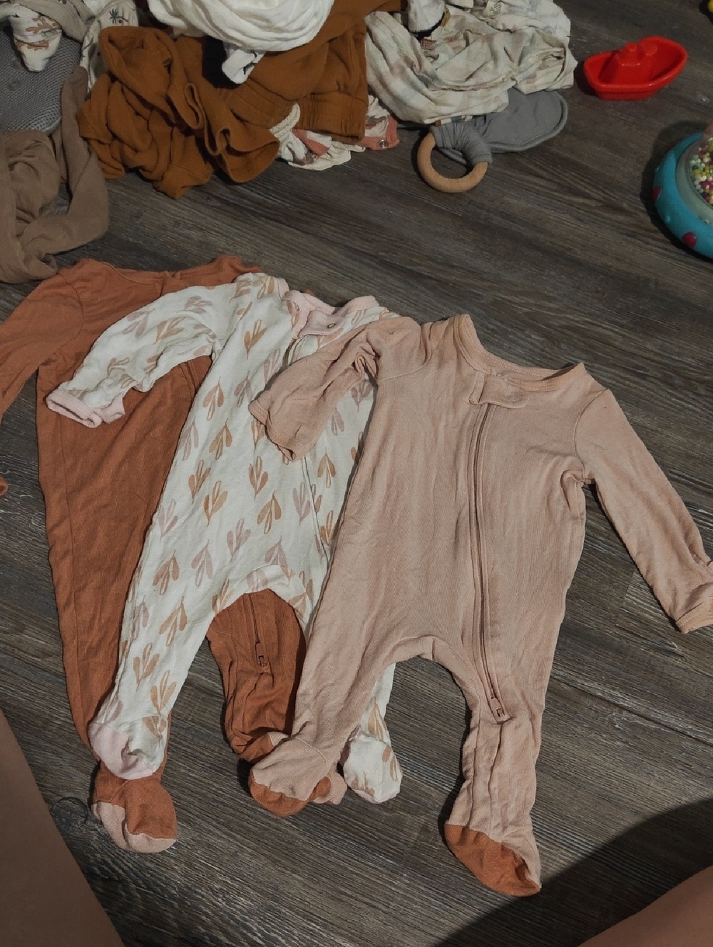 Neutral Pink & Rust Baby One-Piece Sleepers. Cloud Island
